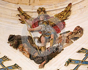 Saint Michael slaying the dragon in Burgos Cathedral