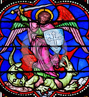 Saint Michael Slaying Satan photo