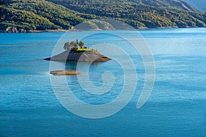 Saint-Michel Chapel and Serre-Poncon Lake in Summer. Alps, France