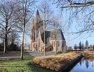 Saint Michel church at sunny daybreak, Ravels, Flanders, Belgium