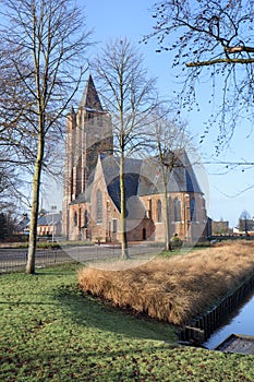 Saint Michel church at sunny daybreak, Ravels, Flanders, Belgium