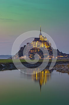 Saint Michel famous castle with water reflectio photo