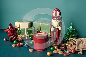 Saint Nicholas gift and cup of coffee