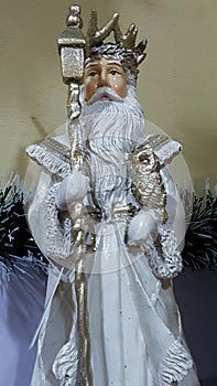 Saint Nicholas mannequin in silver costuming with staff