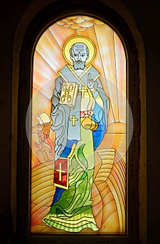 Saint Nicholas of Myra, icon painting on the window photo