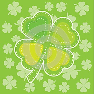 Saint Patrick Day& x27;s card with shamrock leaf on leaves background suitable for St Patrick Day& x27;s greeting card