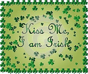 Saint Patrick's Day greeting card with sparkled green clover leaves and text. Inscription - Kiss Me, I am Irish