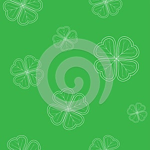 Saint Patrick`s Day seamless pattern with green tender clover leaves on white background.