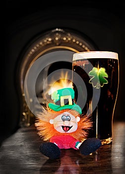 Saint Patrick's Leprechaun with black Irish beer