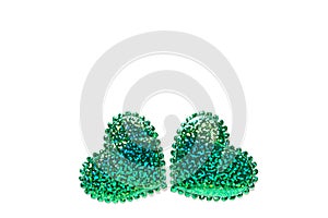 Saint Patrick and Saint Valentine day concept, green glitter hearts like irish shamrock clover