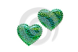 Saint Patrick and Saint Valentine day concept, green glitter hearts like irish shamrock clover