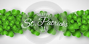 Saint Patricks Day banner. Green clovers and stylish lettering on a white background. Holiday cover. Vector illustration