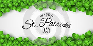Saint Patricks Day banner. Green clovers and stylish lettering on a white background. Holiday frame. Festive cover. Vector