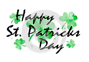 Saint Patricks day greeting card with green shamrock leaves watercolour style Cloverleaf and black Calligraphy Lettering