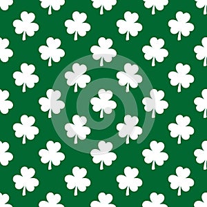 Saint Patricks Day shamrock seamless pattern. Green clover leaves on white background. St. Patricks Day backdrop. Vector