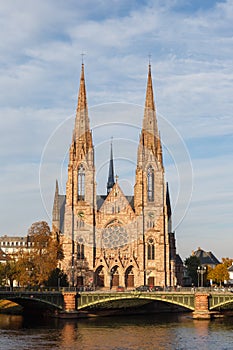 Saint-Paul church at Ill river water portrait format Alsace in Strasbourg France