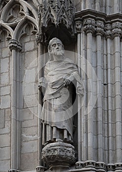 Saint Paul in a niche at the left side of the West entrance to the Basilica de Santa Maria del Mar in Barcelona, Spain. photo