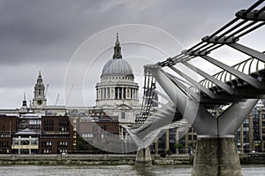 Saint Paul`s cathedral from millennium bridge, London