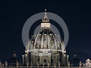 Saint Peter Basilica dome at night Vatican City, Rome, Italy