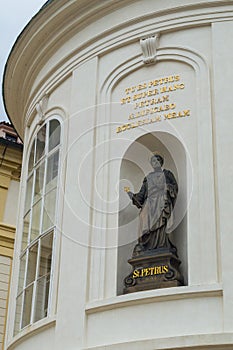 Saint Peter Petrus statue on the treasury of st. Vitus cathedral in Prague, Czech Republic