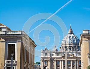 Saint Peter`s basilica seen from Via della Conciliazione photo