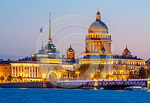 Saint Petersburg cityscape with St. Isaac`s cathedral, Admiralty building and Palace bridge at sunset, Russia