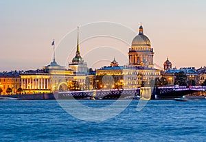 Saint Petersburg cityscape with St. Isaac`s cathedral, Admiralty building and Palace bridge at sunset, Russia