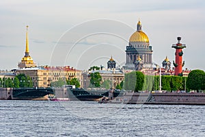 Saint Petersburg cityscape with St. Isaac`s cathedral, Rostral column and Admiralty, Russia