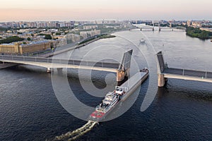Saint Petersburg. Russia. Alexander Nevsky Bridge lifted. The drawbridges of Petersburg. Navigation on the Neva River. Cities of