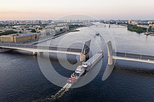 Saint Petersburg. Russia. Alexander Nevsky Bridge lifted. The drawbridges of Petersburg. Navigation on the Neva River. Cities of