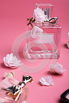 Saint-Petersburg, Russia - augest 30, 2019: Dior perfume - Miss Dior Blooming bouguet  around pink  background photo