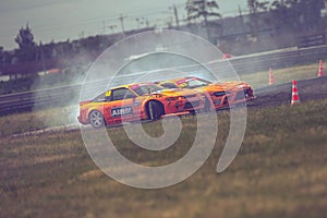 Saint-Petersburg, Russia - August 15, 2018: Powerful race car drifting on speed track