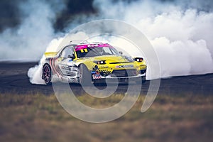 Saint-Petersburg, Russia - August 15, 2018: Powerful race car drifting on speed track