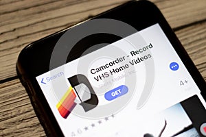 Saint-Petersburg, Russia - 25 December 2019: Camcorder - Record VHS Home Videos icon on App Store page close up top view on phone