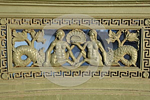 Saint Petersburg, Russia. A fragment of the fence of Anichkov bridge with the mermaids.