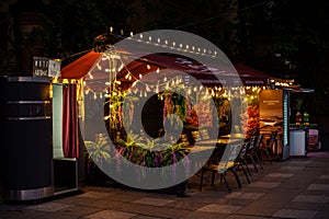 Temporary Baltica open beer restaurant with light decorations