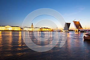 Saint Petersburg skyline at white nights with drawn Palace bridge, Peter and Paul fortress, Rostral columns and Kunstkamera, Russi