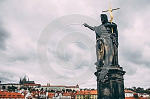 Saint on prague charles bridge