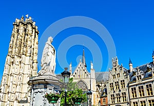 Saint Rumbold`s Cathedral and the statue of Archduchess Margaret of Austria in Mechelen, Belgium