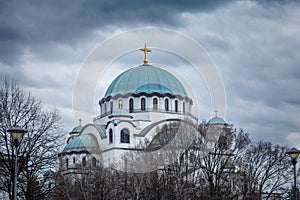 Saint Sava Cathedral Temple (Hram Svetog Save) during a cloudy afternoon. This orthodox church is the main
