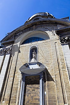 Saint statue and the English Convent in Bruges