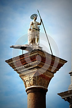 Saint Theodor statue on a column on the Piazza San Marco of Venice in Italy - Colonne di San Teodoro