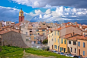 Saint Tropez village church tower and old rooftops view, famous tourist destination on Cote d Azur