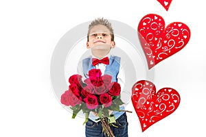 Saint Valentine`s day. Handsome gentleman boy with blue vest, red tie, red roses bucket and red balloons . Valentines day kids. L