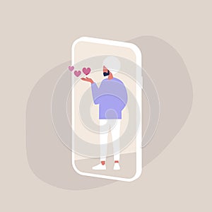 Saint Valentine`s Day, indian male character blowing kisses on a smartphone screen, millennial lifestyle