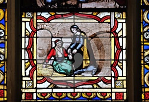 Saint Vincent de Paul helps a prisoner