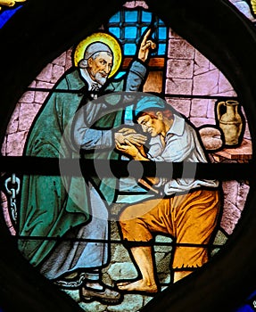 Saint Vincent de Paul on a Stained Glass in Paris