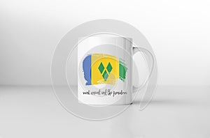 Saint Vincent and the Grenadines flag on white coffee mug. photo