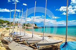 Sainte Maxime sand turquoise beach and sailboats view photo