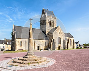 Notre-Dame-de-l'Assomption church and calvary in Sainte-Mere-Eglise, Normandy